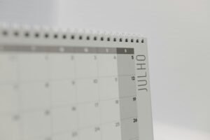 Close-up of a minimalist calendar showing the month of July.